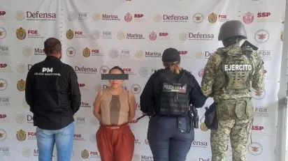 detienen_a_funcionaria_del_instituto_municipal_de_la_mujer_de_minatitlxn_por_violencia_familiar.jpeg_191469768